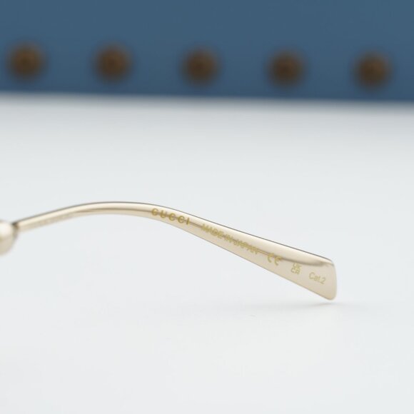 Gucci GG1922S 003 Oval Sunglasses - Endura Gold with White Pearl/Brown main image 9
